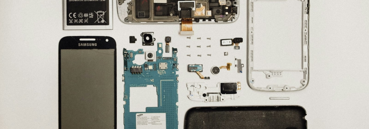 a picture of a cell phone and parts